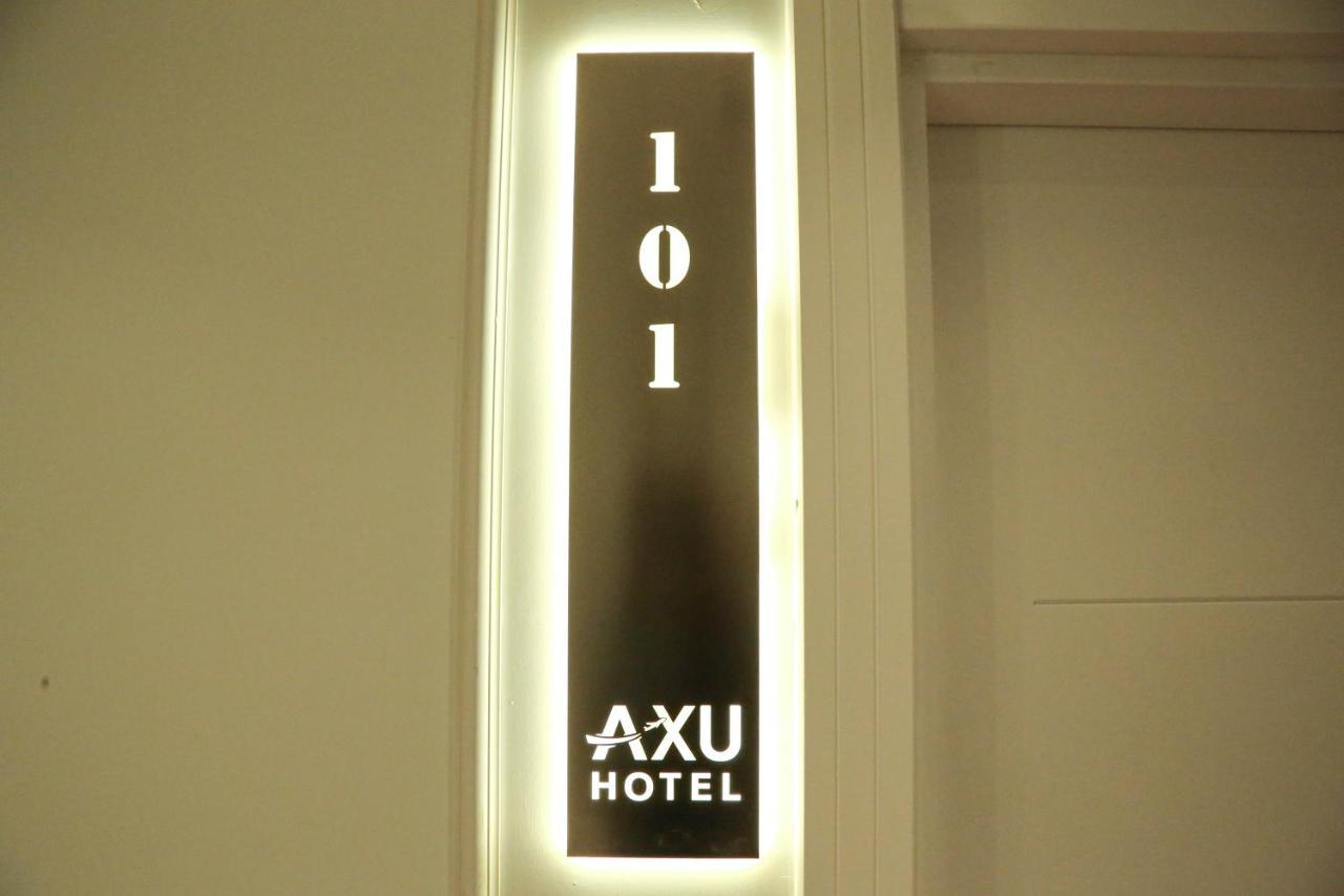 Axu Airport Hotel Arnavutkoy Zewnętrze zdjęcie A room sign at Axu Hotel